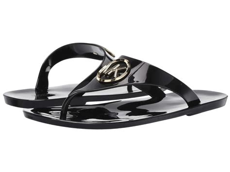 michael kors flip flops black and white striped|Michael Kors jelly sandals black.